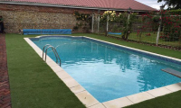 artificial grass swimming pool surround.jpg